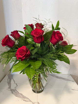 Dozen Red Roses with Lush Greens
