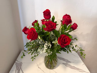 Dozen Red Roses with Greens and Baby's Breath Arrangement