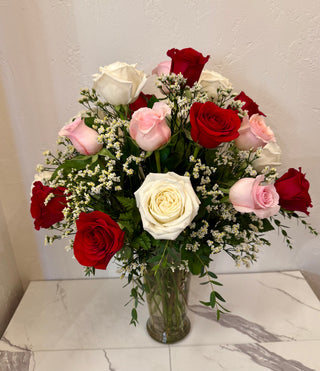 Two dozen mixed roses w/ filler flowers